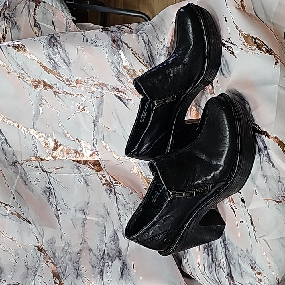 Black leather Born sexy platform ankle shoe zi  Worn twice. FITS LIKE A 7.